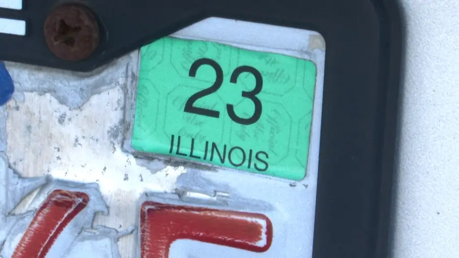 23_sticker_on_illinois_licence_plates.jpeg